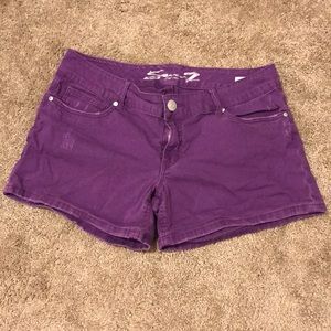 Purple distressed denim shorts